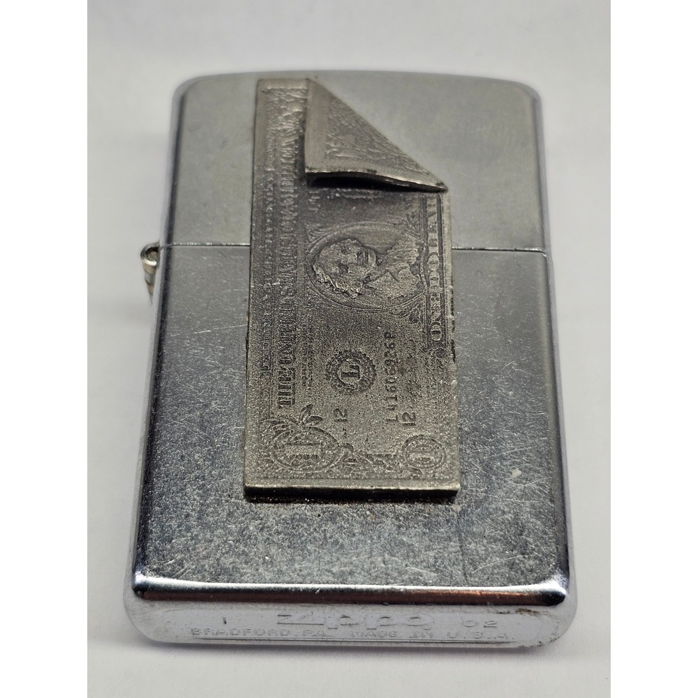 Rare Zippo Dollar Bill hidden Dime Silver 2002 Currency un used limited edition?
